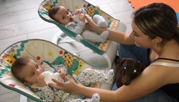 Bottle feding twins in bouncer seats