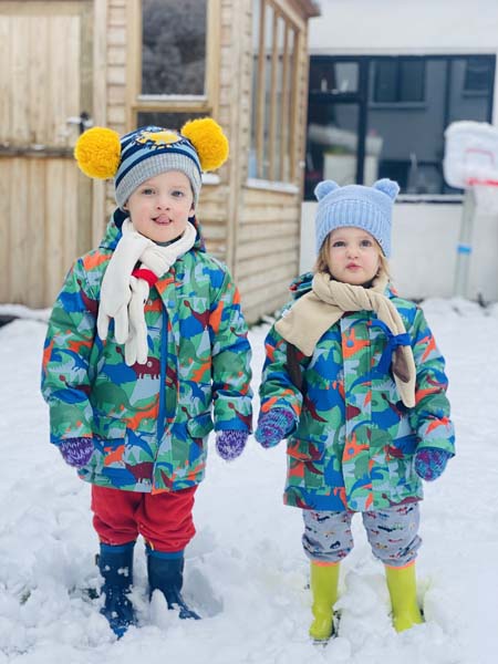 Boy and girl twins in the snow