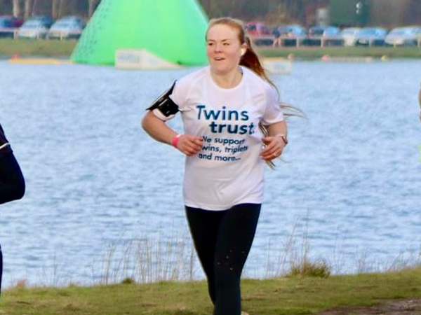 Amy Edwards running in a Twins Trust T-shirt
