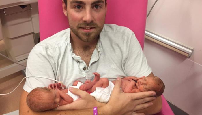 Ben Rean with newborn identical twin girls, Isla and Jemima