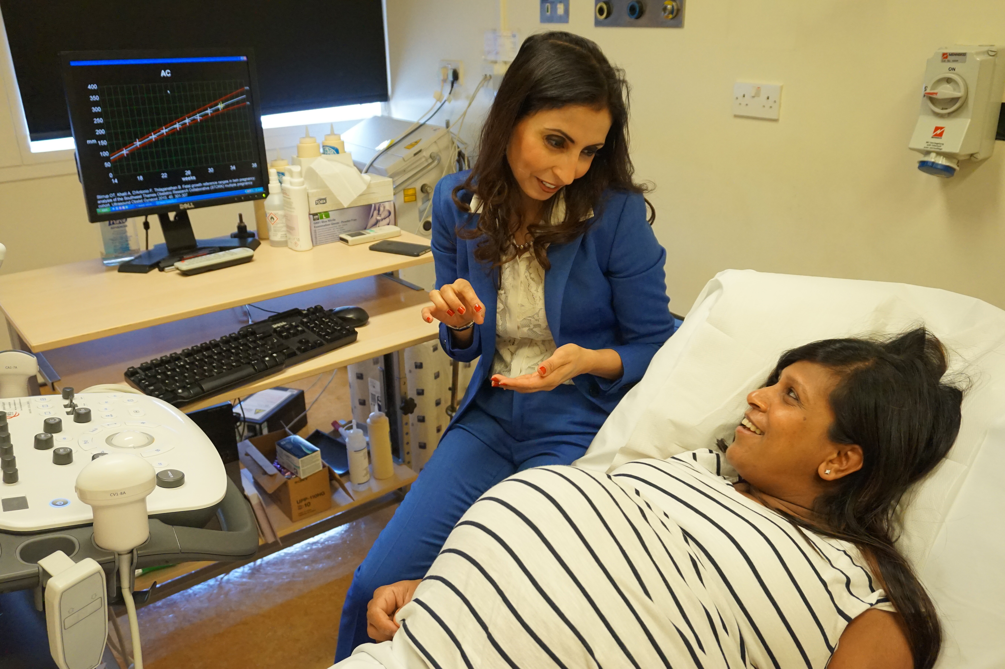 Mum pregnant with twins scan